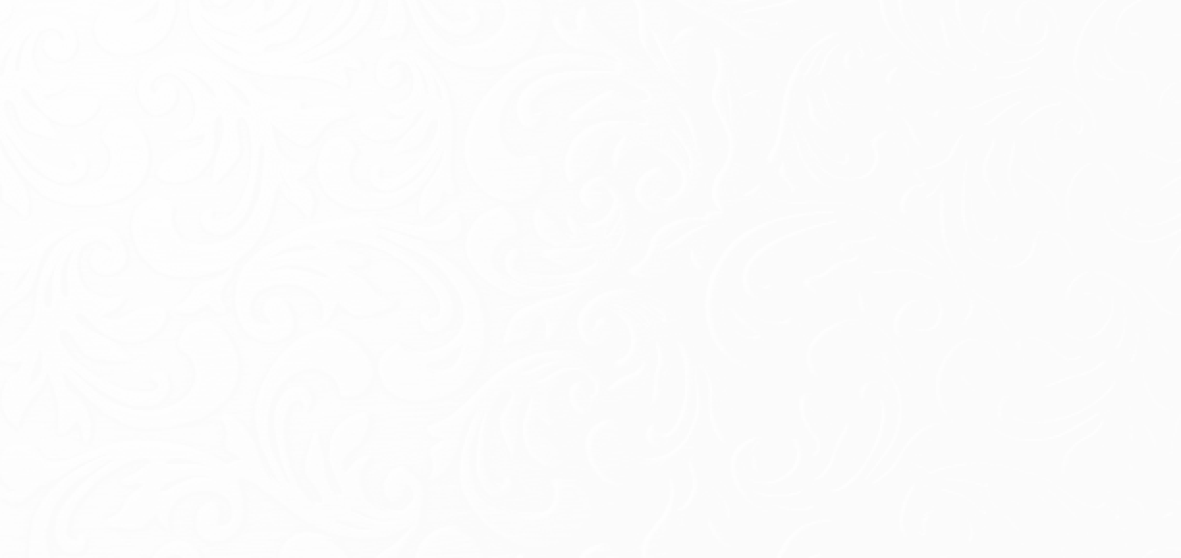 Ornate swirling pattern on a textured surface, transitioning from light grey and clearly visible on the left to dark grey and subtle on the right.